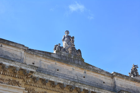 Lorenzo Theater in Noto, named after the silent film actress Tina di Lorenzo. Neoclassical-style building with sculptures on top of the buildingの写真素材