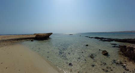 Beautiful bay in Marsa Alam, Egypt. Sandy beach and crystal clear sea. Walking along the beach.の写真素材