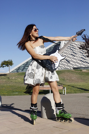 woman with a guitar singingの写真素材