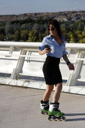 woman skating backwardsの写真素材