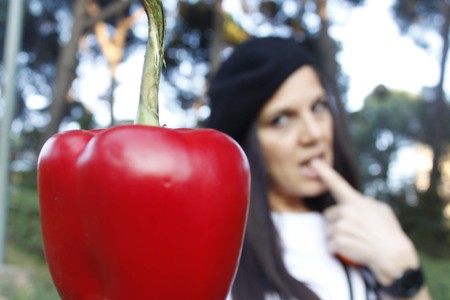 woman behind a red pepperの写真素材
