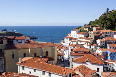 view of the mountainside full of roofs in Cudillero, Spainの写真素材