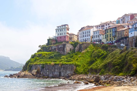 houses in Lastres near the coast, village in Spainの写真素材