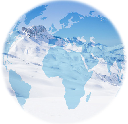 globe over the acher castle mountain in winter, covered of snowの写真素材