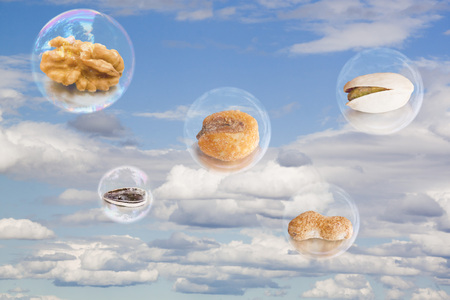 five dried fruit in five air bubbles