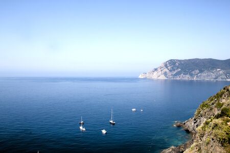The sea of Monterosso, Italy with boatsの写真素材