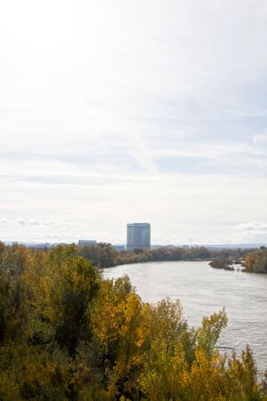 panoramic Torre del agua in Zaragoza behind the Ebro river in a sunny day, Spainの写真素材