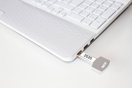 key pendrive in the usb port of a laptopの写真素材