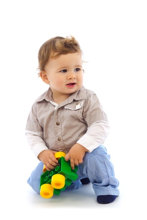 Photo of baby boy with toy in his handの写真素材