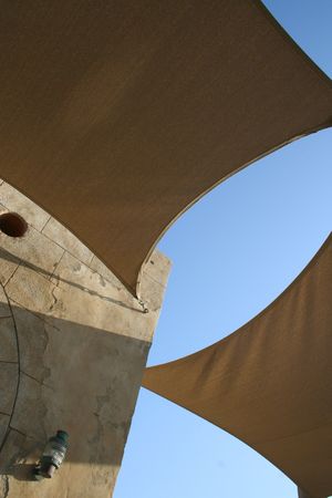 Arabian sun tent below blue sky の写真素材