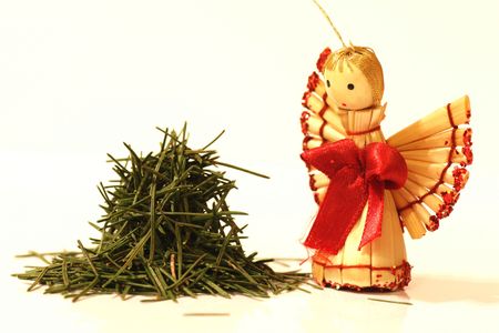 christmas needles and straw angelの写真素材