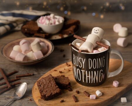 Marshmallow Man Relaxing in a a cup or hot chocolateの写真素材