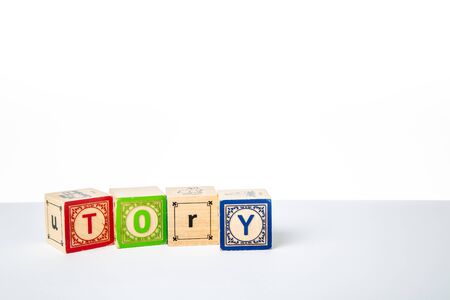 Childrens Wooden Alphabet Blocks Spelling the Word Toryの写真素材
