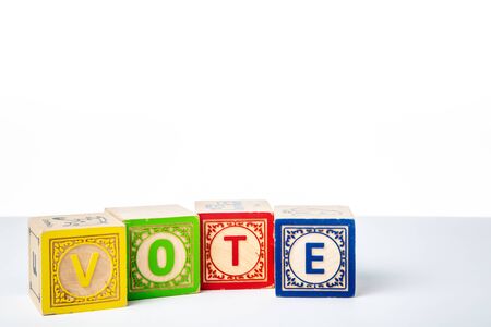 Childrens Wooden Alphabet Blocks Spelling the Word Voteの写真素材