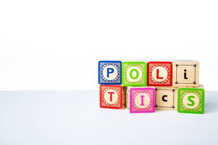 Childrens Wooden Alphabet Blocks Spelling the Word Politicsの写真素材