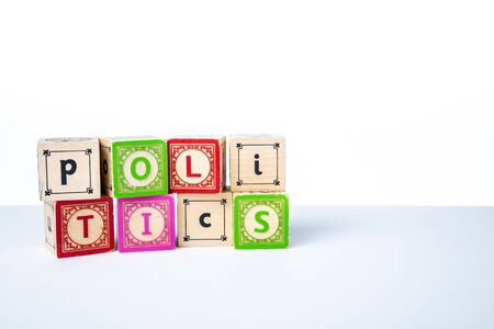Childrens Wooden Alphabet Blocks Spelling the Word Politicsの写真素材