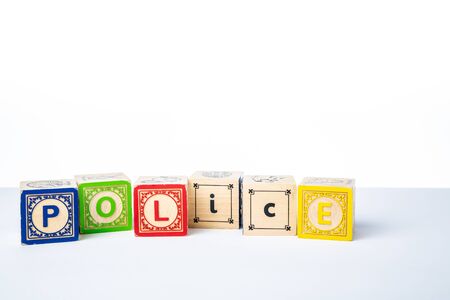 Childrens Wooden Alphabet Blocks Spelling the Word Policeの写真素材