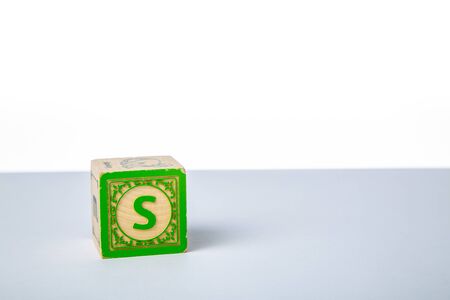 Childrens Wooden Alphabet Block Showing the Letter Sの写真素材