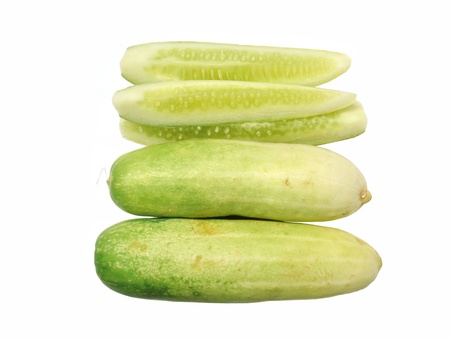 The green cucumbers isolated on whiteの写真素材