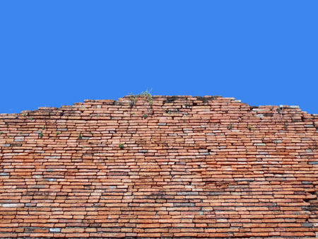 red brick wall on blue skyの写真素材