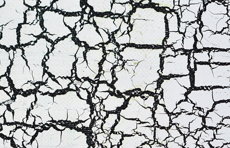 White cracked paint abstract background.