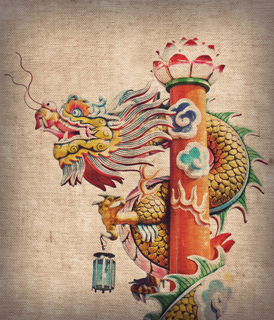 chinese dragon statue with lamb on fabric texture pattern,retro vintage styleの写真素材