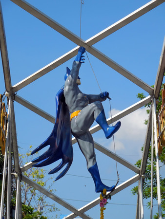 AYUTTAYA,THAILAND - MAY 05, 2014 : Batman model on slings at Thung Bua Chom floating marketのeditorial素材