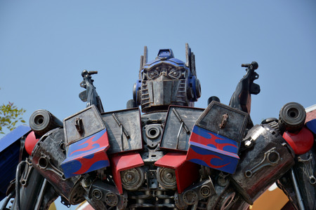 AYUTTAYA,THAILAND - DECEMBER 28, 2013 : The Replica of Optimus Prime robot made from iron part of a Car display at Thung Bua Chom floating marketのeditorial素材