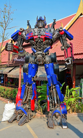 AYUTTAYA,THAILAND - FEBRUARY 07, 2015 : The Replica of Optimus Prime robot made from iron part of a Car display at Thung Bua Chom floating marketのeditorial素材