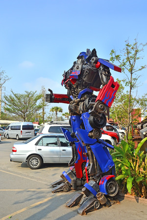 AYUTTAYA,THAILAND - MARCH 04, 2015 : The Replica of Optimus Prime robot made from iron part of a Car display at Thung Bua Chom floating marketのeditorial素材