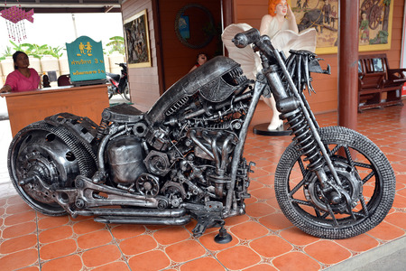AYUTTHAYA ,THAILAND- APRIL 25, 2015 : The Motorcycle with Aliens mixed Predators made from scrap metal at Tung Bua Chom floating marketのeditorial素材