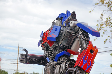 AYUTTAYA,THAILAND - AUGUST 09, 2015 : The Replica of Optimus Prime robot made from iron part of a Car display at Thung Bua Chom floating marketのeditorial素材