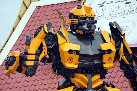 AYUTTAYA,THAILAND - OCTOBER 10, 2015 : The Replica of Bumblebee robot made from iron part of a Car display at Thung Bua Chom floating marketのeditorial素材
