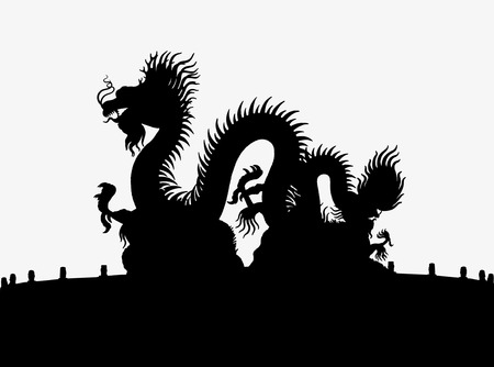 Silhouette statue of chinese dragonの写真素材