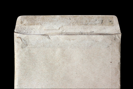 closeup old dirty envelope on black backgroundの写真素材