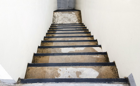 Stairs on the side of the building after raining