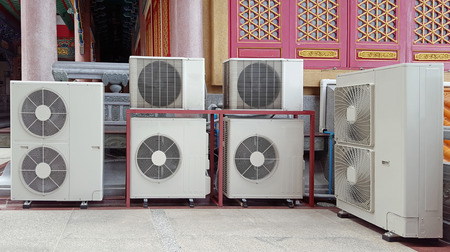 Compressors of the air condition in a Chinese templeの写真素材