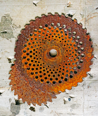 dirty rusty circular saw bladeの写真素材