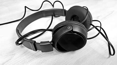 Headphones on wooden boards, process to black & white style