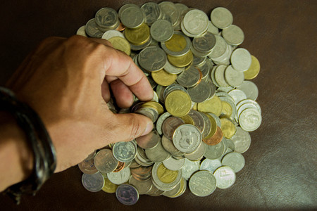Saving money coins. Coins of Thailand background.の写真素材