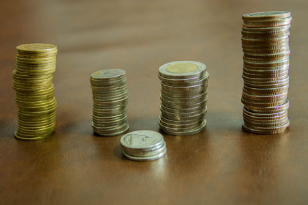 Saving money coins. Coins of Thailand background.