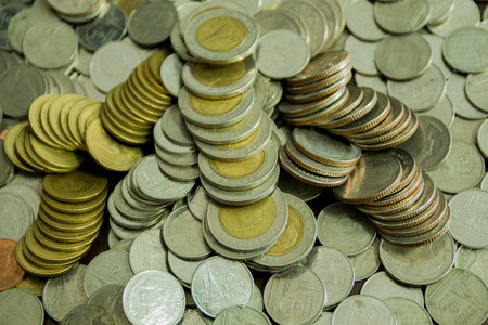Saving money coins. Coins of Thailand background.の写真素材