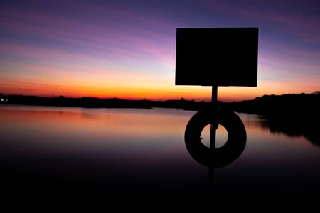 Evening atmosphere on the edge of a large swamp.When the sun goes down.の写真素材