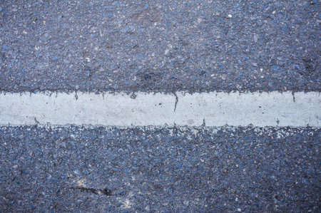 asphalt and white road lineの写真素材