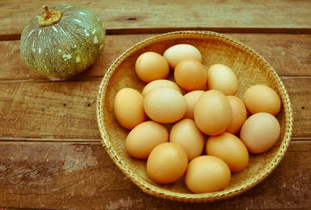 Organic eggs and wooden floorの写真素材