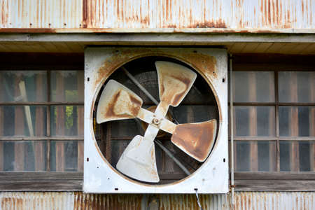Ventilation blower of an old cowshedの写真素材