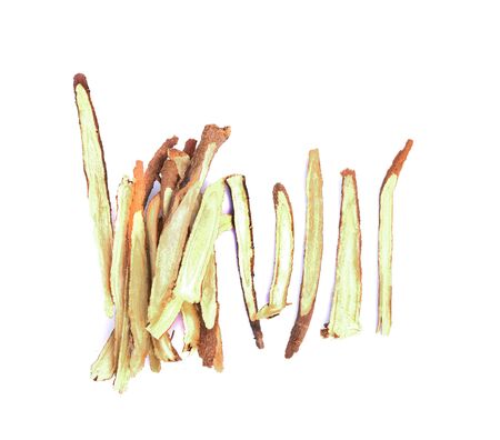 Slice Licorice roots on white backgroundの写真素材