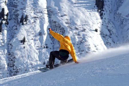 Snowboarder landing softly