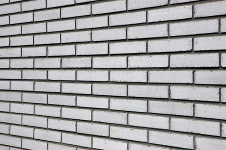 Close view of a white brick wallの写真素材