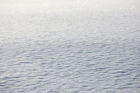 Texture shot on fresh snowflakes glittering in the sunの写真素材